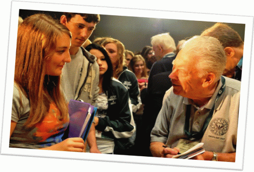 Francis Curry, WWII Medal of Honor, with students.