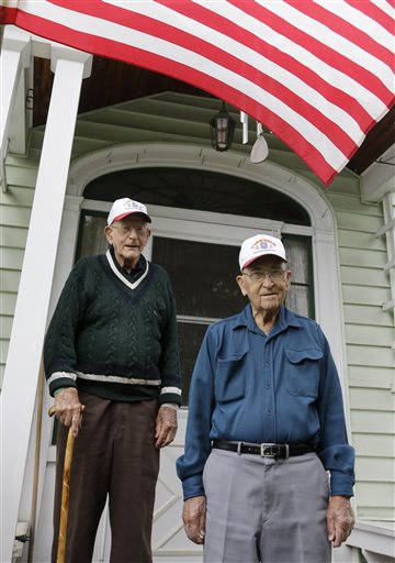 In this Wednesday, May 22, 2013 photo, World War II veterans Bob Addison, left, and Jerry West pose for a photo, in Glens Falls, N.Y. Addison and West share more than a longtime friendship. They share some of the same memories of bloody battles fought on Pacific islands while serving with an elite Marine Corps unit that was the forerunnner of today's U.S. Special Forces. Living just miles apart, the two men are among the last surviving members of the original Marine Raider battalions that were the first American ground troops to attack Japanese-held territory. (AP Photo/Mike Groll)