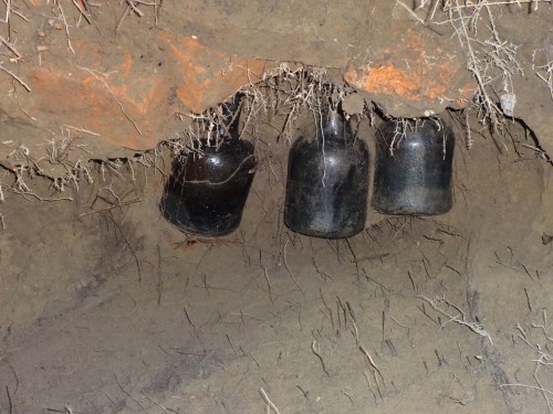 The Bottles. Unbroken. Filled? King Tut's tomb moment. "The tension mounts..."