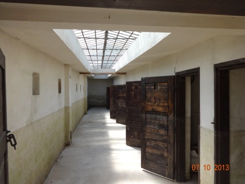 Inside the Small Fortress. Prison. No the two toned wall color is not on purpose. Evidence of recent floods. Note also cell doors.