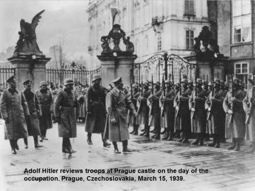 Adolf Hitler reviews troops at Prague castle