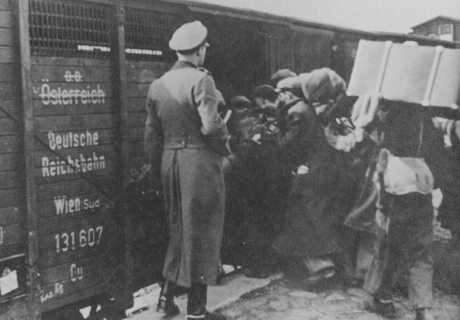 Jews are forced into boxcars destined for the Belzec extermination camp. Lublin, Poland, 1942. USHMM.