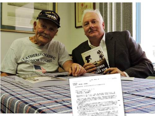 Mr. Peachman and author, at debut book signing, Aug. 8, 2015. Article in Japanese in foreground. Mary Rozell photo.